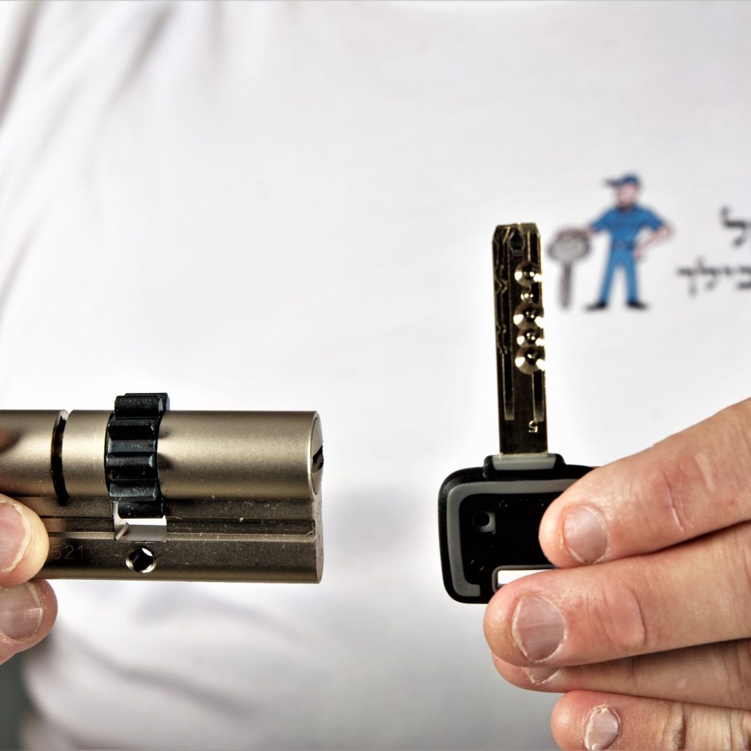 holding a key and a lock